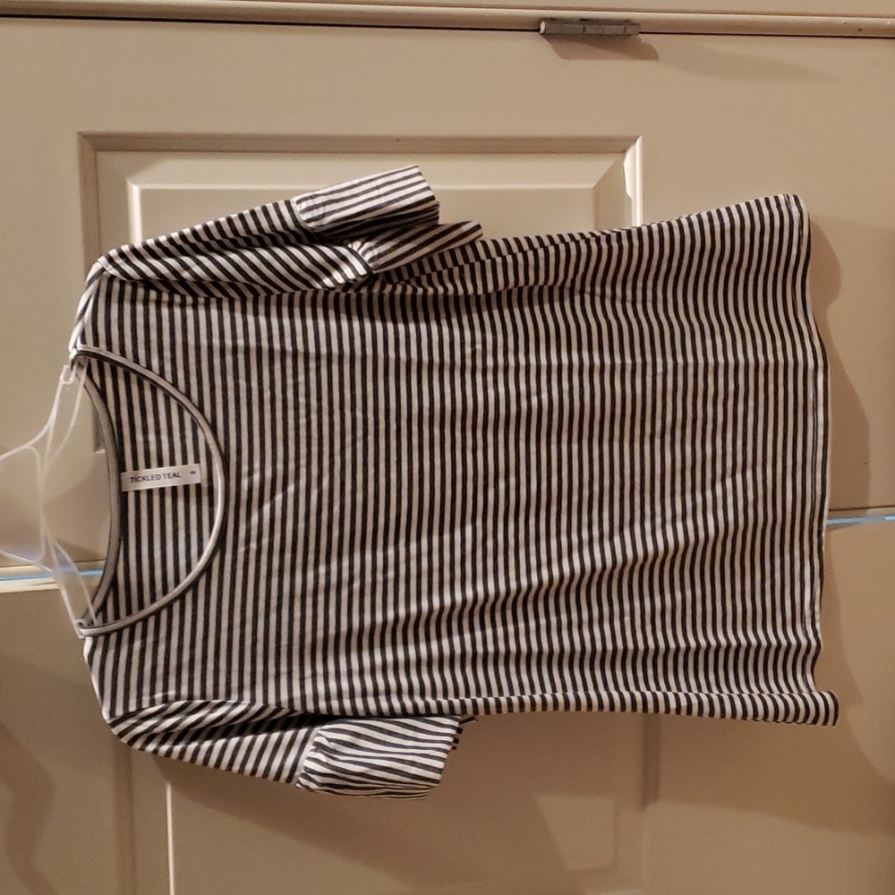 Tunic length ruffle accent sleeve top